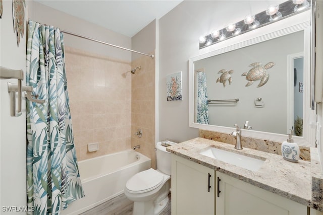 bathroom featuring vanity, toilet, and shower / bathtub combination with curtain