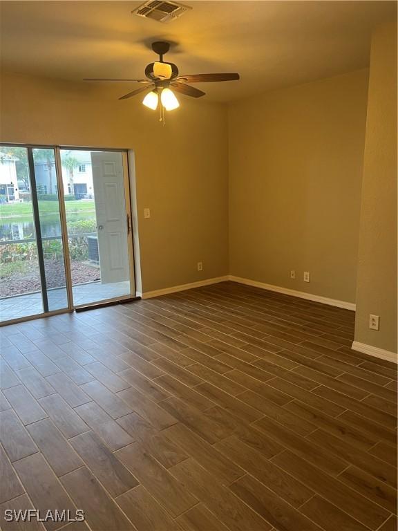 unfurnished room with ceiling fan