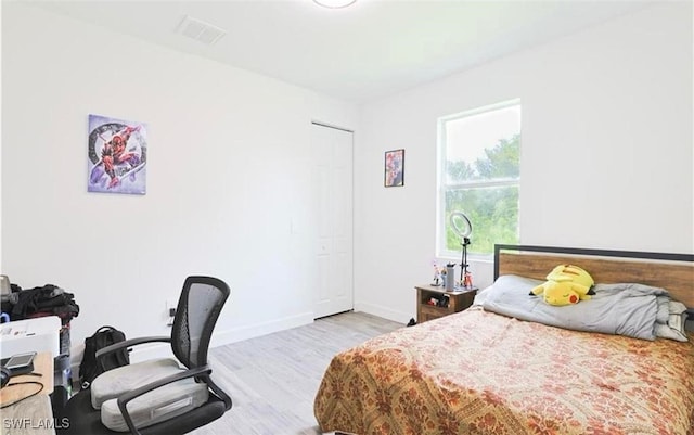 bedroom featuring light hardwood / wood-style flooring