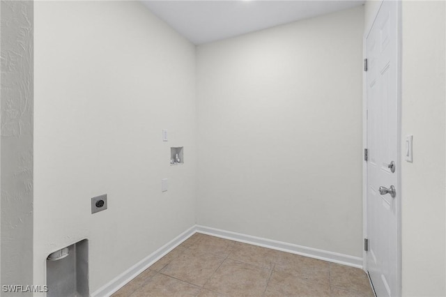 laundry room featuring washer hookup, light tile patterned floors, and electric dryer hookup