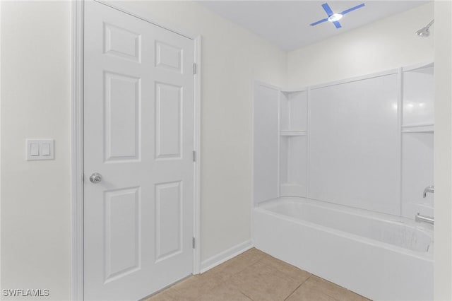 bathroom featuring tub / shower combination and tile patterned flooring