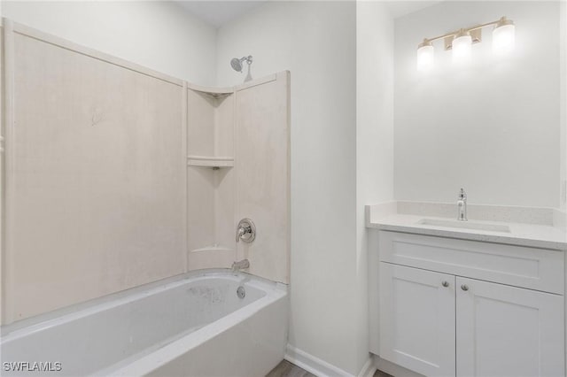 bathroom with vanity and washtub / shower combination