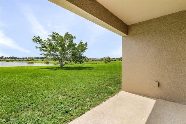 view of yard with a water view