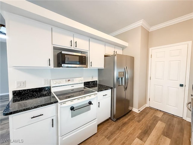 kitchen with light hardwood / wood-style floors, white cabinetry, ornamental molding, and appliances with stainless steel finishes