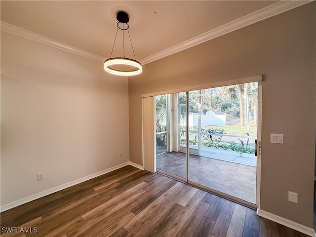 doorway to outside with dark hardwood / wood-style floors and ornamental molding