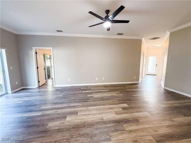 spare room with ceiling fan, hardwood / wood-style flooring, and ornamental molding