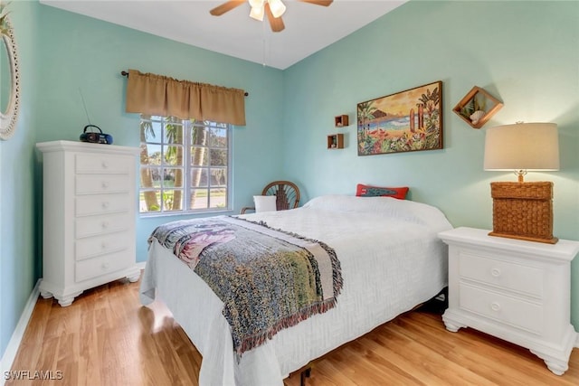 bedroom featuring ceiling fan and light hardwood / wood-style flooring