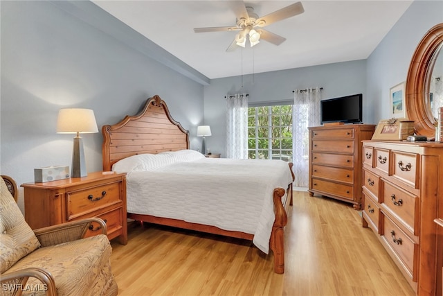 bedroom with ceiling fan and light wood-type flooring