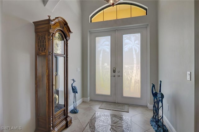 tiled foyer entrance with french doors