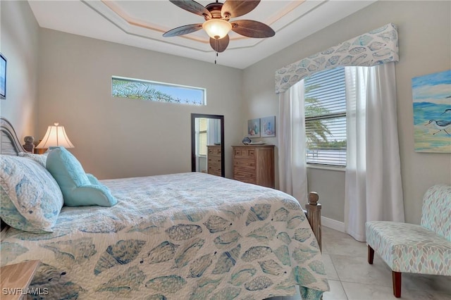 bedroom featuring ceiling fan and light tile patterned floors