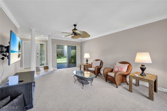 sitting room featuring ceiling fan, light colored carpet, and ornamental molding