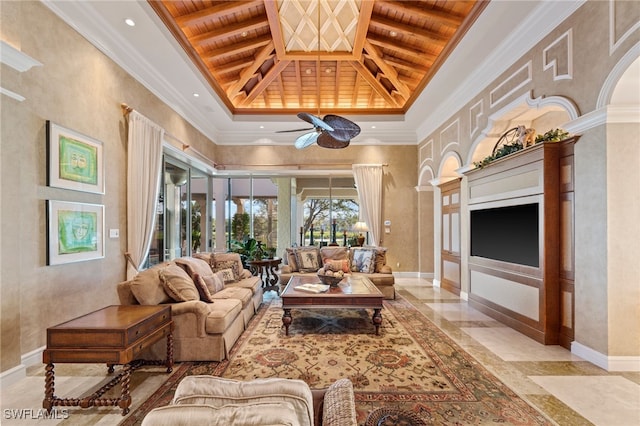 living room featuring a towering ceiling, ornamental molding, wooden ceiling, and beamed ceiling