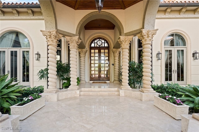 doorway to property with french doors