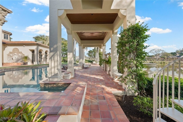 view of patio / terrace featuring a water view