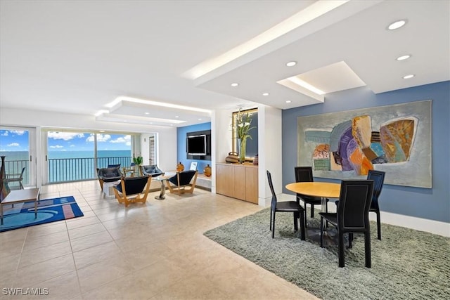 dining space featuring light tile patterned floors