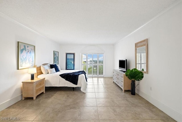 bedroom with ornamental molding and a textured ceiling