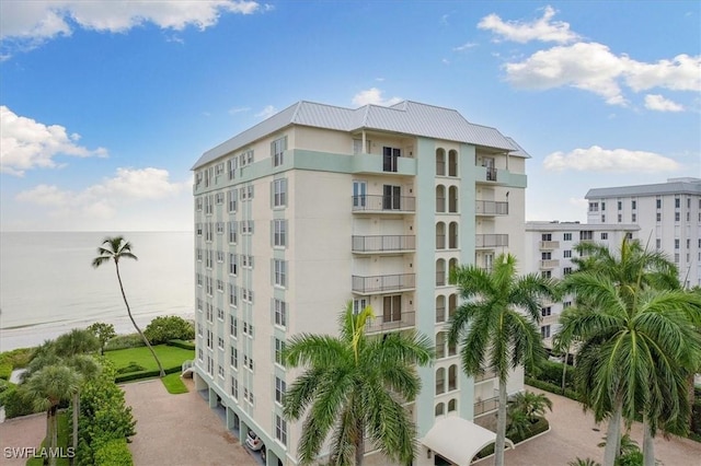 view of property with a water view