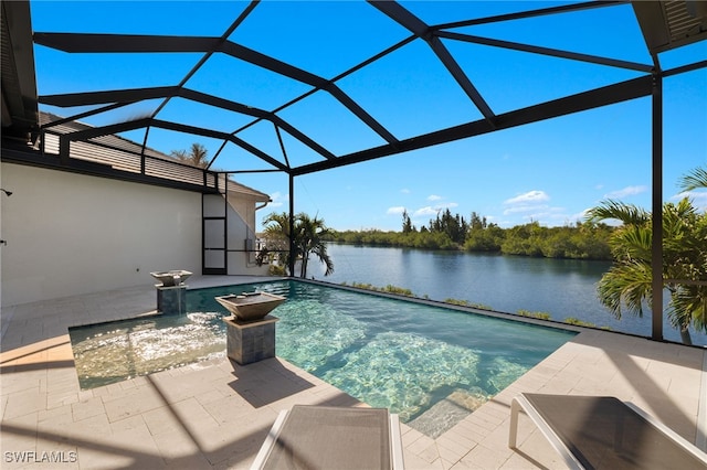 view of pool featuring a lanai, a water view, and a patio area