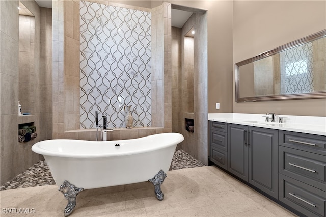 bathroom with vanity and a bathing tub