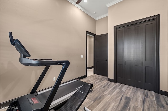 workout room with ornamental molding