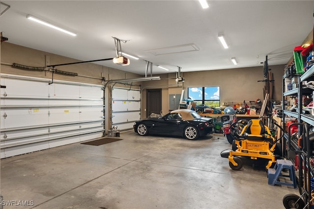 garage featuring a garage door opener