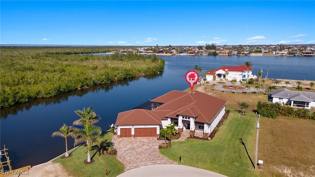 bird's eye view with a water view