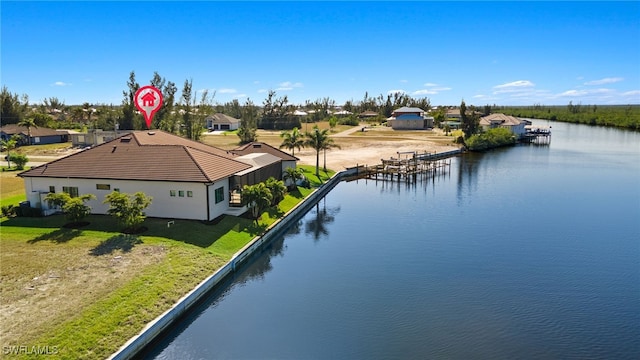 drone / aerial view featuring a water view