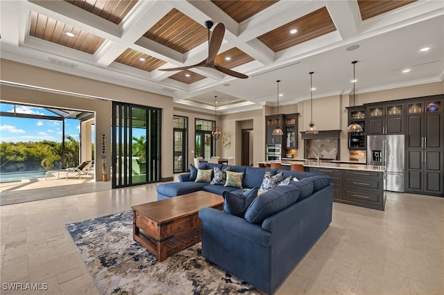 living room with coffered ceiling, wooden ceiling, ornamental molding, and beam ceiling