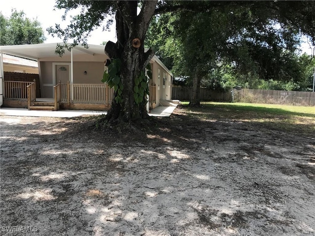 view of yard featuring a porch