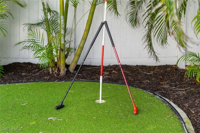 view of playground featuring an area to practice putting