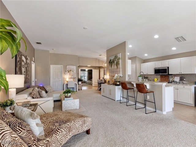 living room with light colored carpet