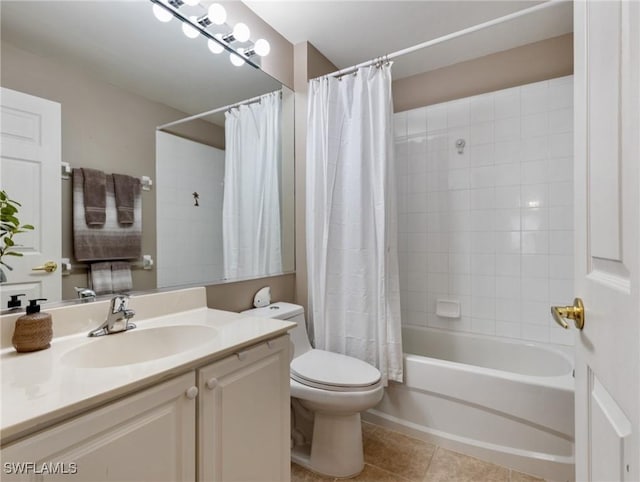 full bathroom featuring toilet, vanity, tile patterned floors, and shower / tub combo with curtain