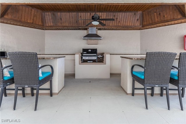 view of patio featuring a gazebo and ceiling fan