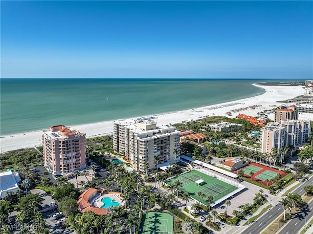 aerial view featuring a water view and a beach view