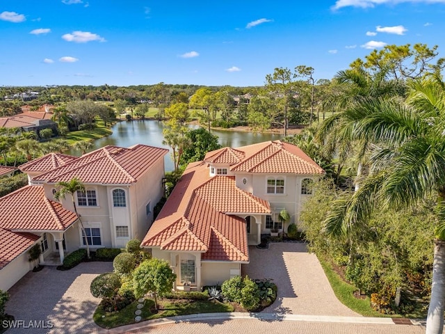 birds eye view of property featuring a water view