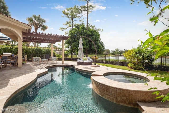 view of pool with a pergola, a patio area, and an in ground hot tub