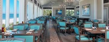 dining space featuring a chandelier