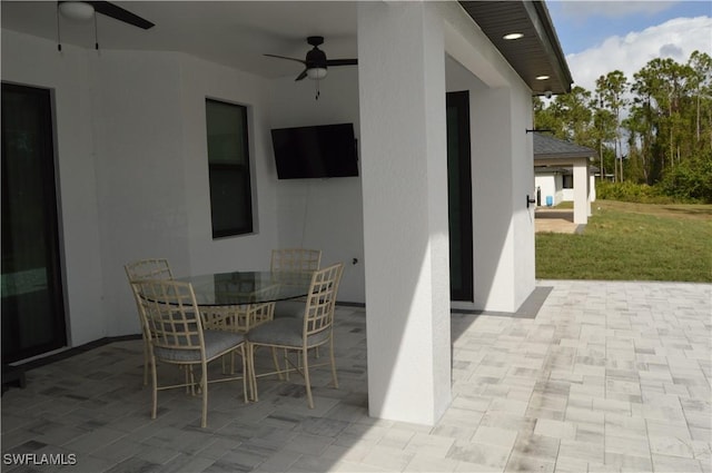 view of patio / terrace with ceiling fan