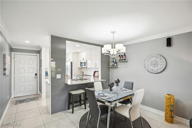 tiled dining space featuring ornamental molding