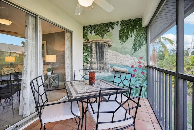 balcony featuring ceiling fan