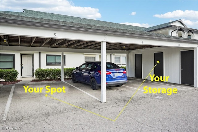 view of parking with a carport