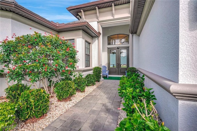 doorway to property with french doors