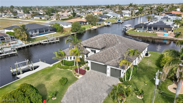 drone / aerial view featuring a water view