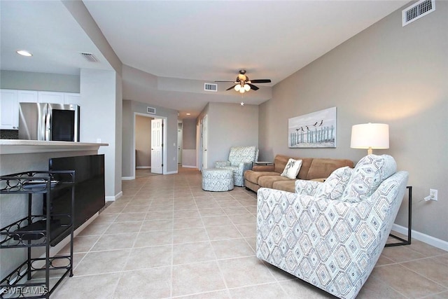 16590 Crownsbury Way Unit 102, Fort Myers, FL 33908 - living room featuring baseboards, ceiling fan, visible vents, and light tile patterned floors