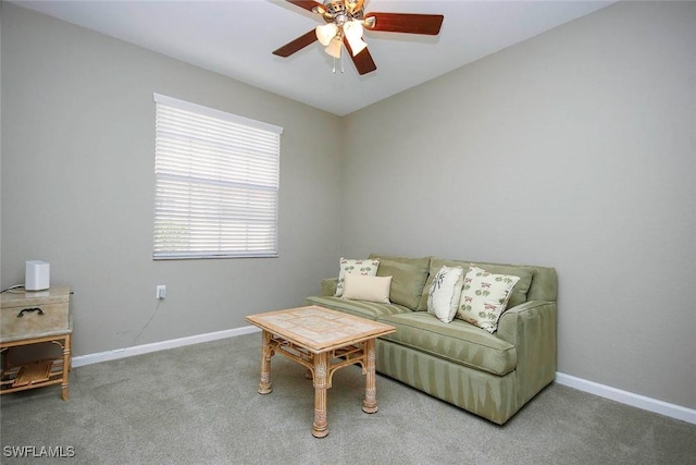 16590 Crownsbury Way Unit 102, Fort Myers, FL 33908 - living area featuring baseboards, carpet, and a ceiling fan