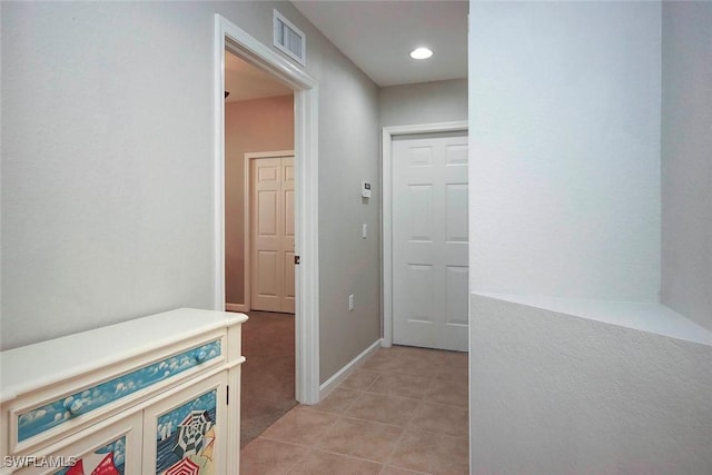 16590 Crownsbury Way Unit 102, Fort Myers, FL 33908 - corridor featuring light tile patterned floors, recessed lighting, baseboards, and visible vents