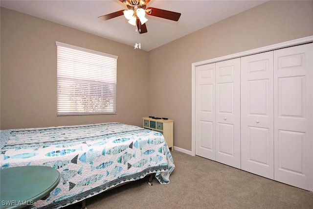 16590 Crownsbury Way Unit 102, Fort Myers, FL 33908 - bedroom featuring a closet, carpet flooring, ceiling fan, and baseboards