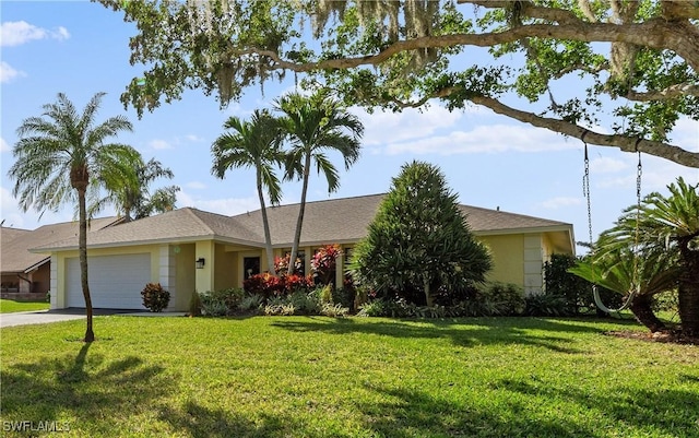 ranch-style house with a front lawn and a garage