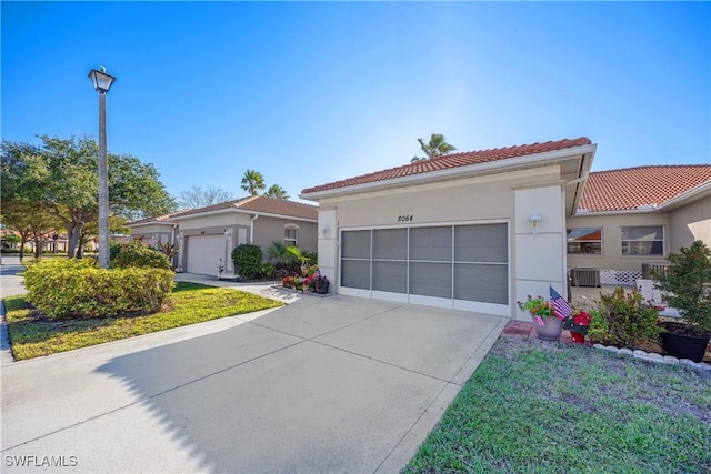 mediterranean / spanish-style house featuring a front lawn