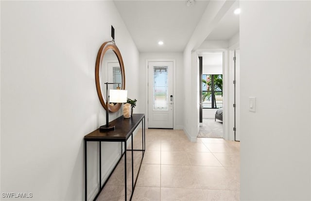 doorway featuring light tile patterned floors